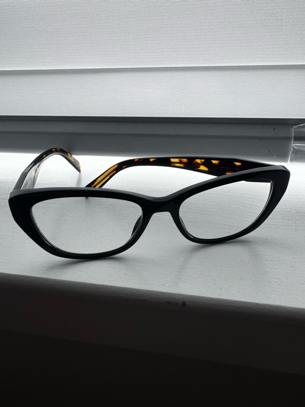 Prada Black Cat-Eye Glasses with Tortoiseshell Temples